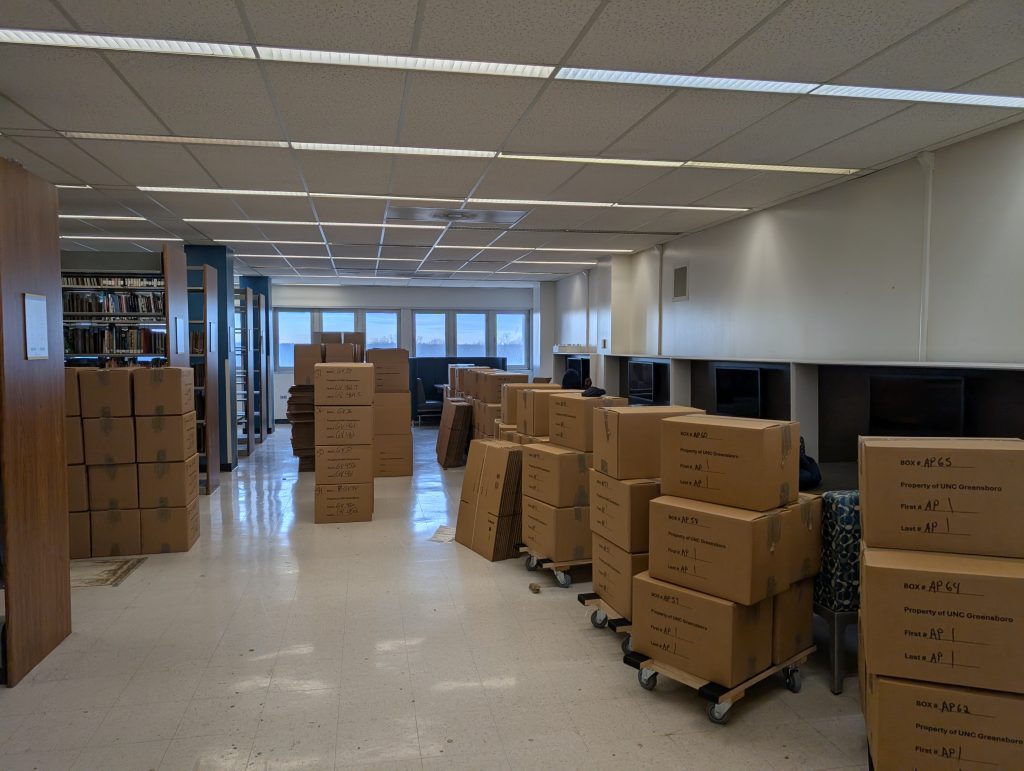 boxes of books being staged for the move to a remote storage facility