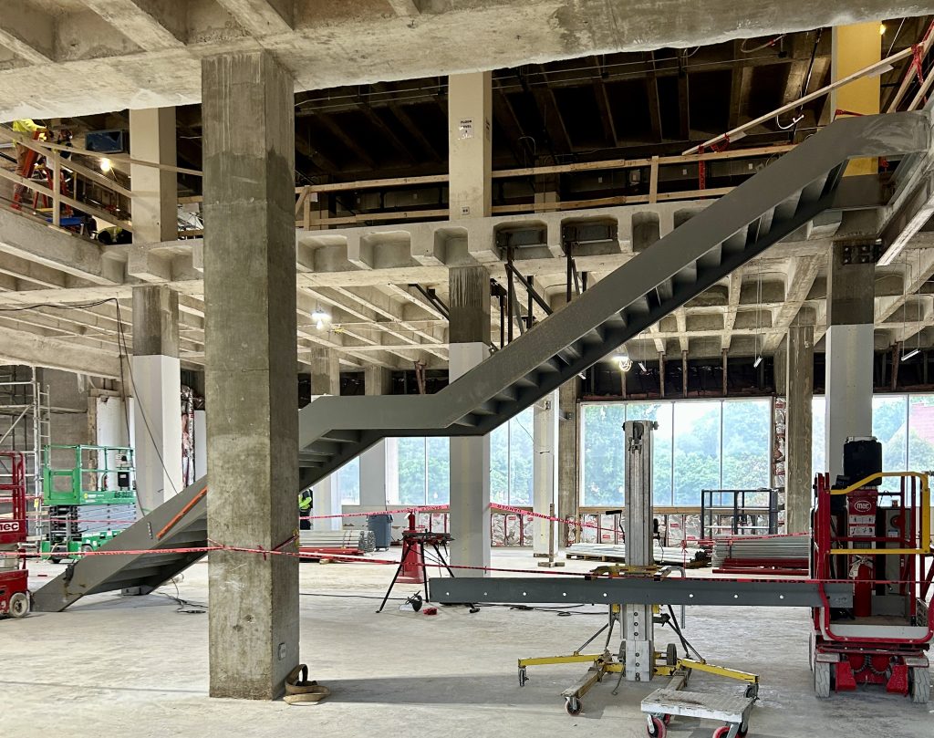 A staircase in a construction zone as seen from the side.